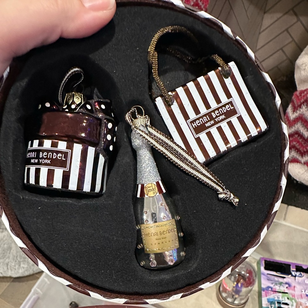 Discontinued Henri bendel ornaments. Shopping bag, champagne and gift box.
